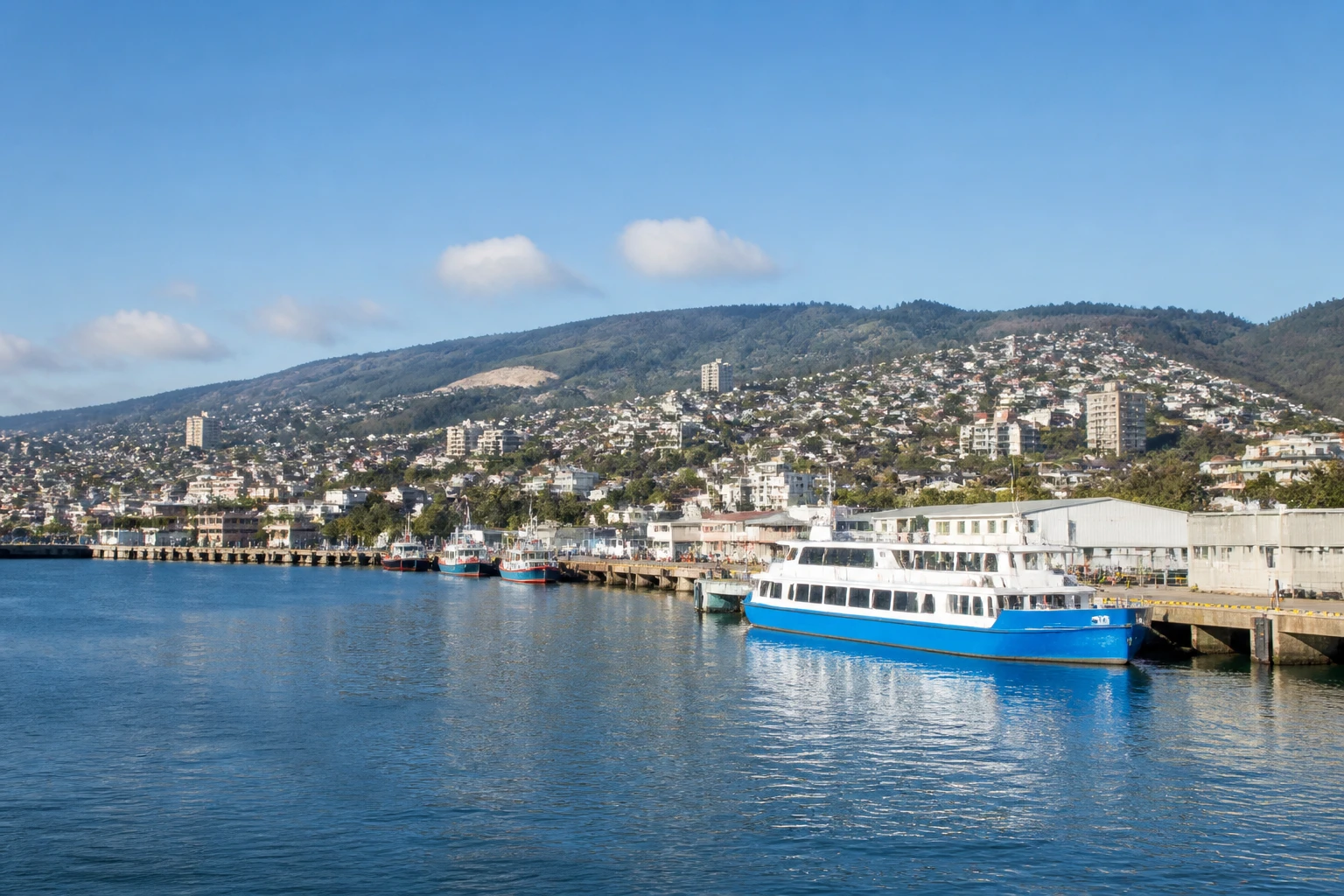 Representative cruise port destination view: San Antonio, Chile; passenger waterfront and harbor water, not an exact landmark photograph.