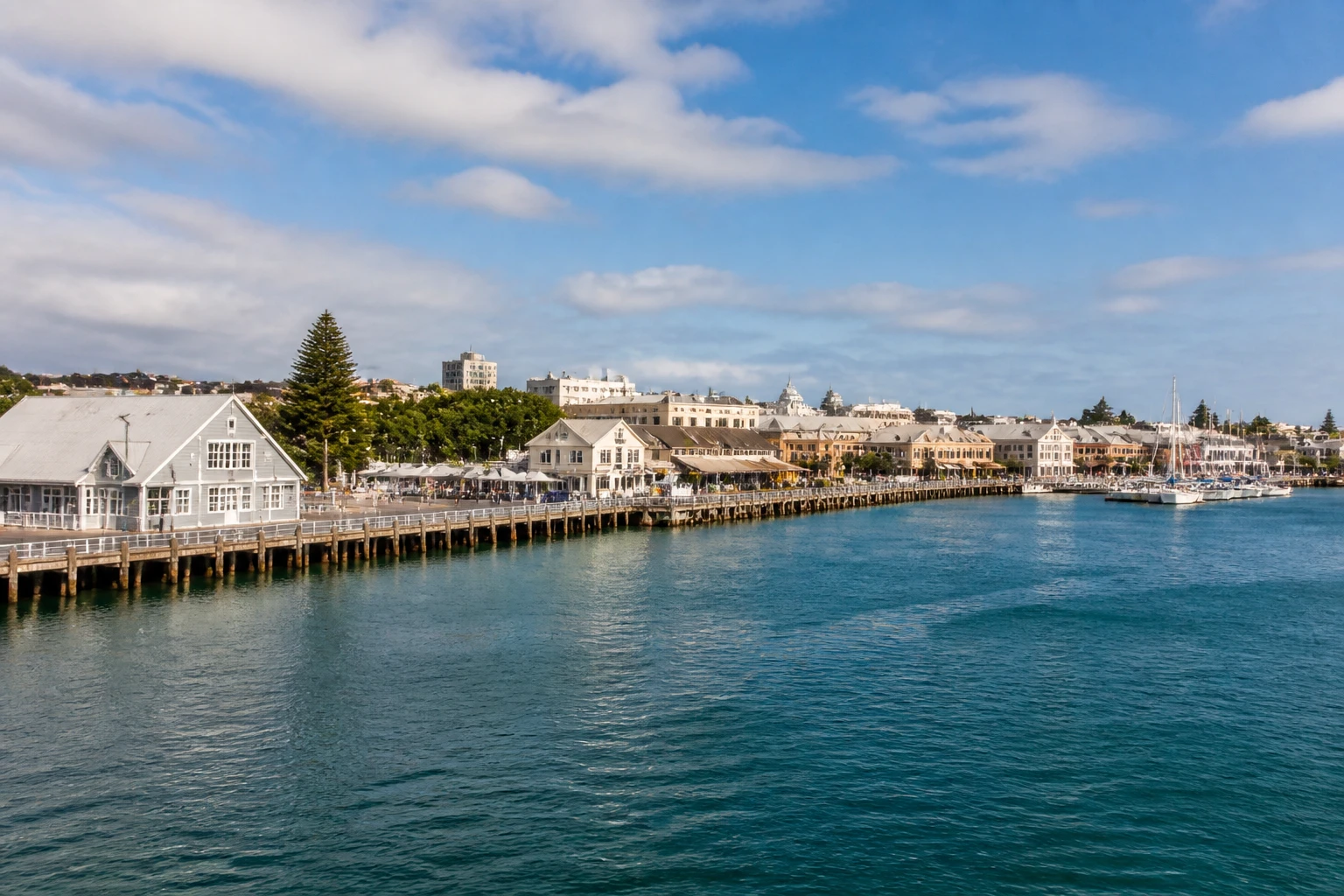 Representative cruise port destination view: Fremantle, Australia; passenger waterfront and harbor water, not an exact landmark photograph.