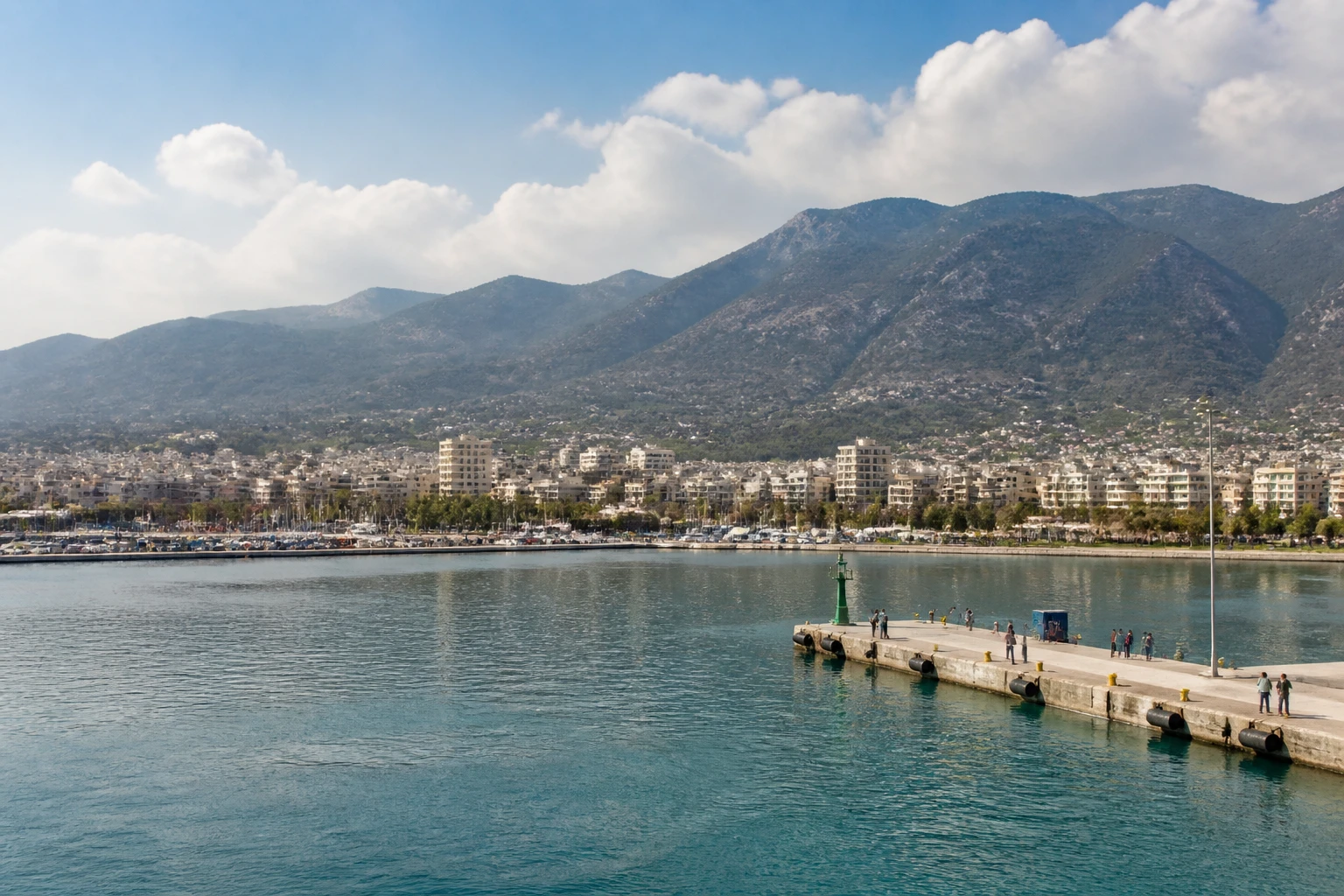 Representative cruise port destination view: Kalamata, Greece; passenger waterfront and harbor water, not an exact landmark photograph.