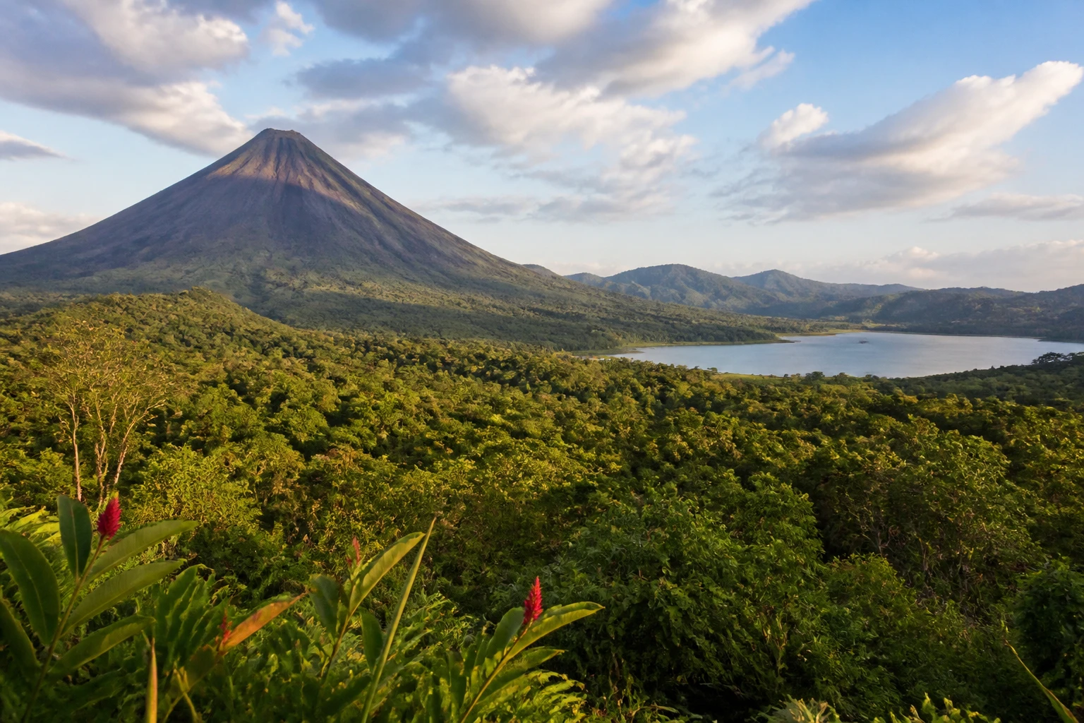 Representative nature destination overview of Costa Rica, showing regional terrain, vegetation, and natural light rather than an exact landmark view.