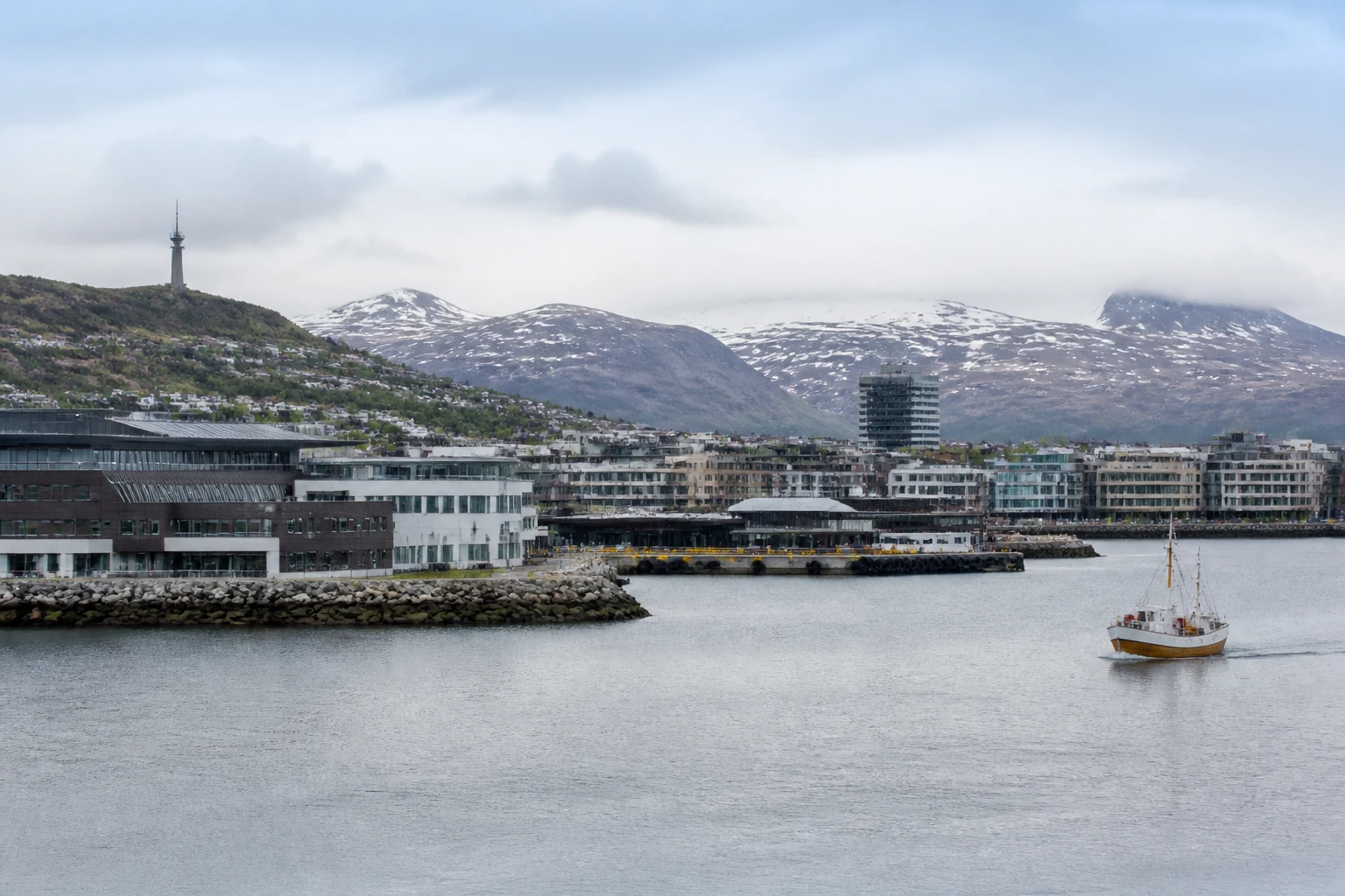 Representative cruise port destination view: Bodo, Norway; passenger waterfront and harbor water, not an exact landmark photograph.