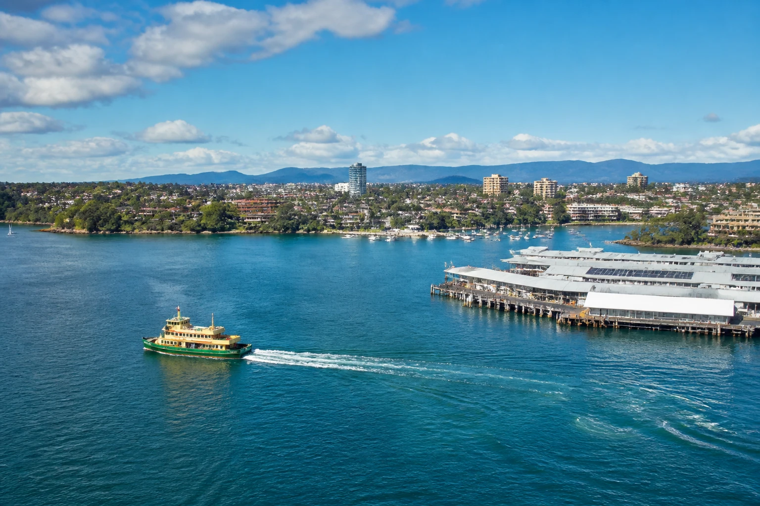 Representative cruise port destination view: Great Oyster Bay, Australia; passenger waterfront and harbor water, not an exact landmark photograph.
