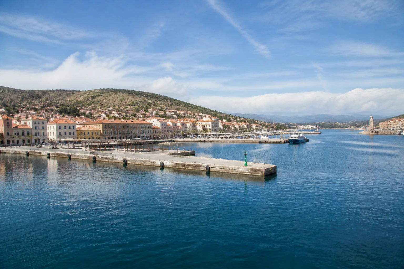 Representative cruise port destination view: Port Vendres, France; passenger waterfront and harbor water, not an exact landmark photograph.