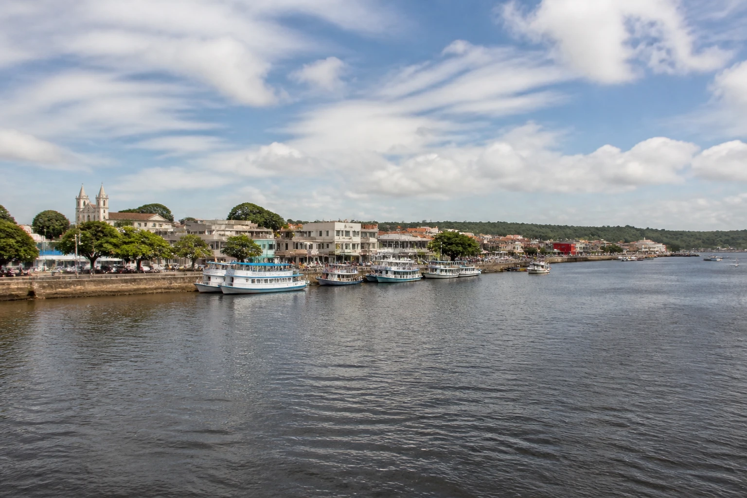 Representative cruise port destination view: Santarem, Brazil; passenger waterfront and harbor water, not an exact landmark photograph.