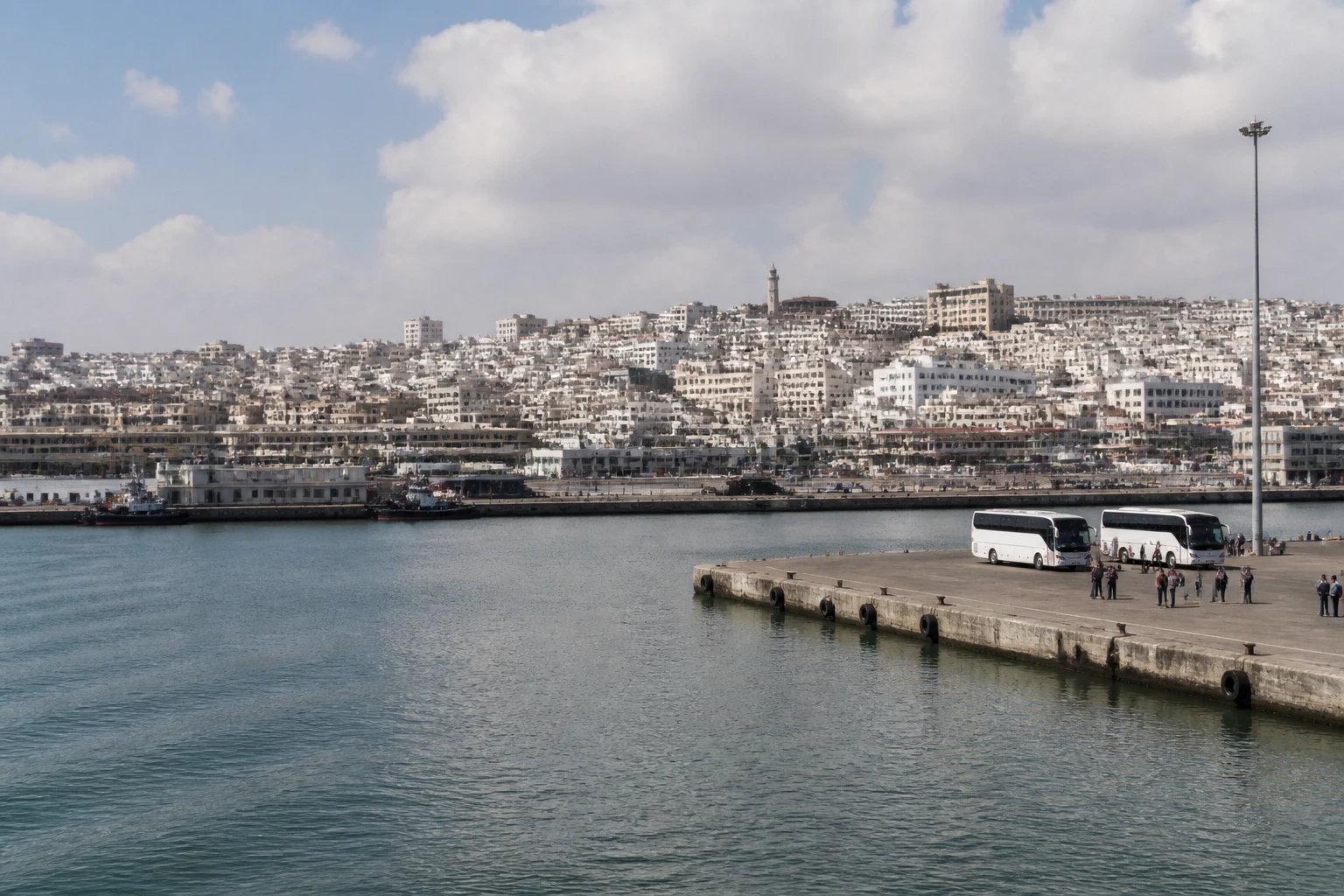 Representative cruise port destination view: Casablanca, Morocco; passenger waterfront and harbor water, not an exact landmark photograph.