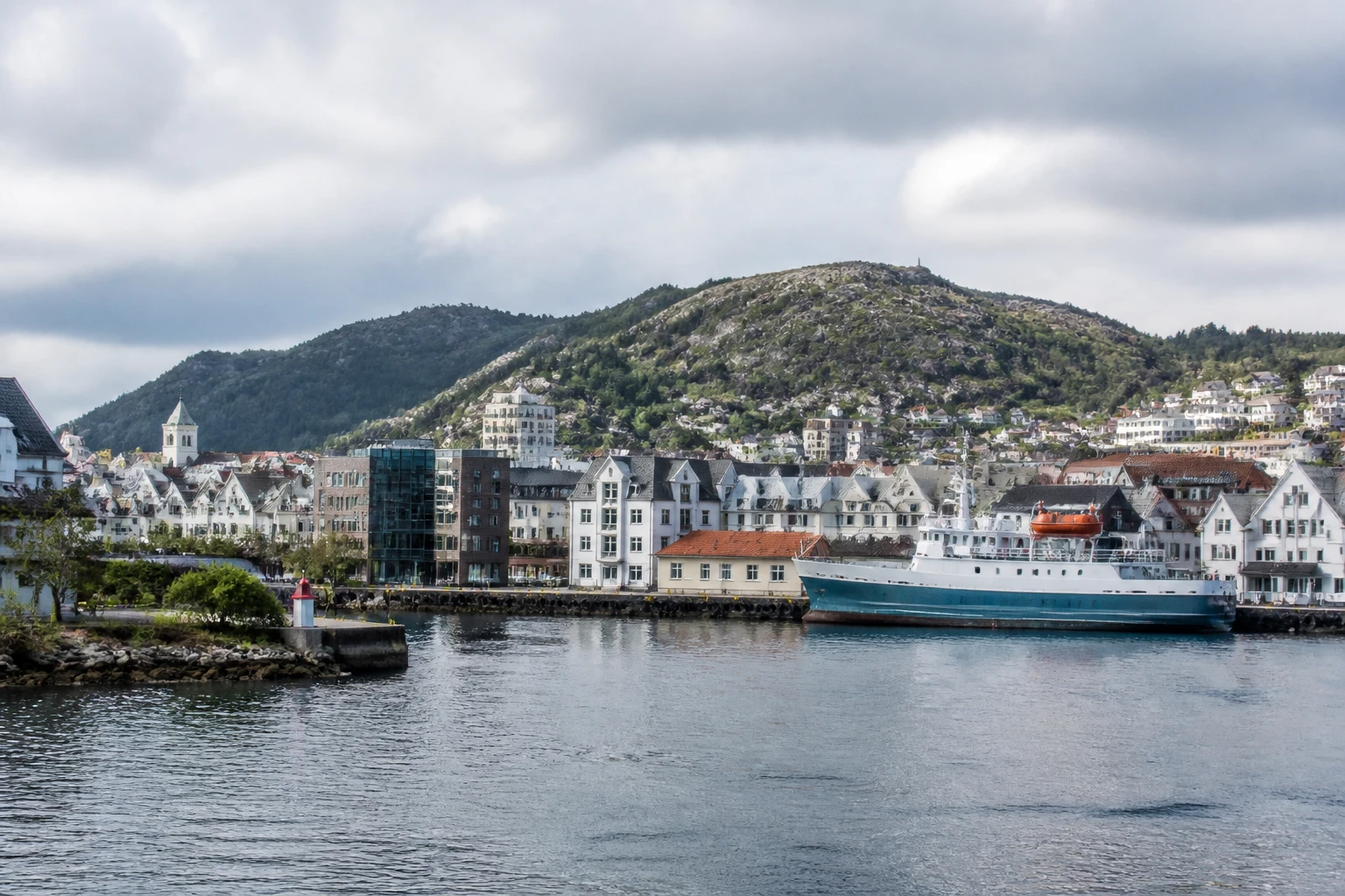 Representative cruise port destination view: Haugesund, Norway; passenger waterfront and harbor water, not an exact landmark photograph.
