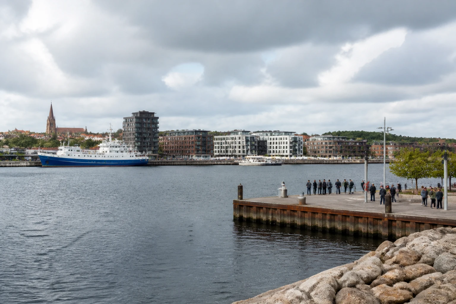 Representative cruise port destination view: Fredericia, Denmark; passenger waterfront and harbor water, not an exact landmark photograph.