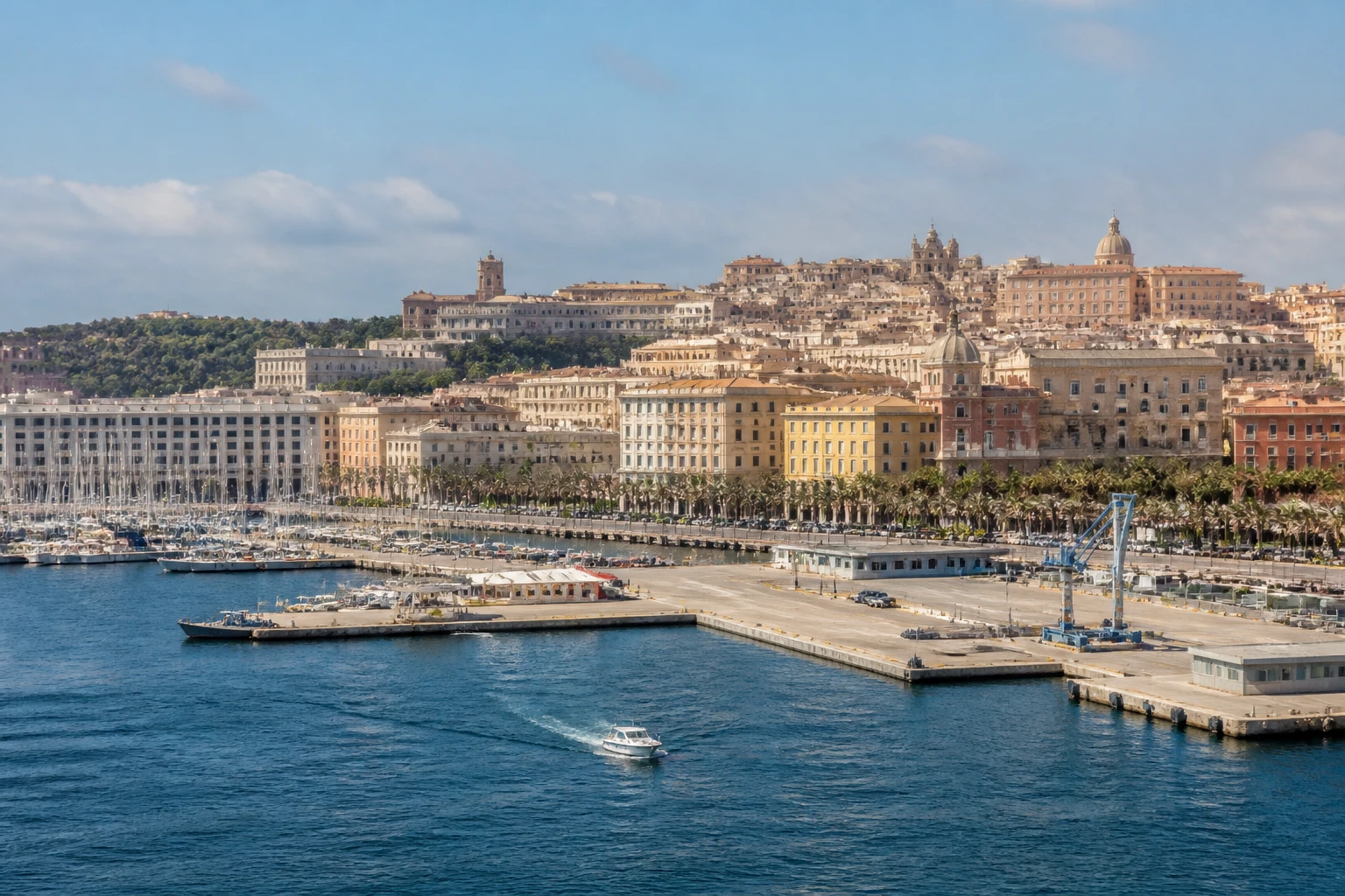 Representative cruise port destination view: Cagliari, Italy; passenger waterfront and harbor water, not an exact landmark photograph.