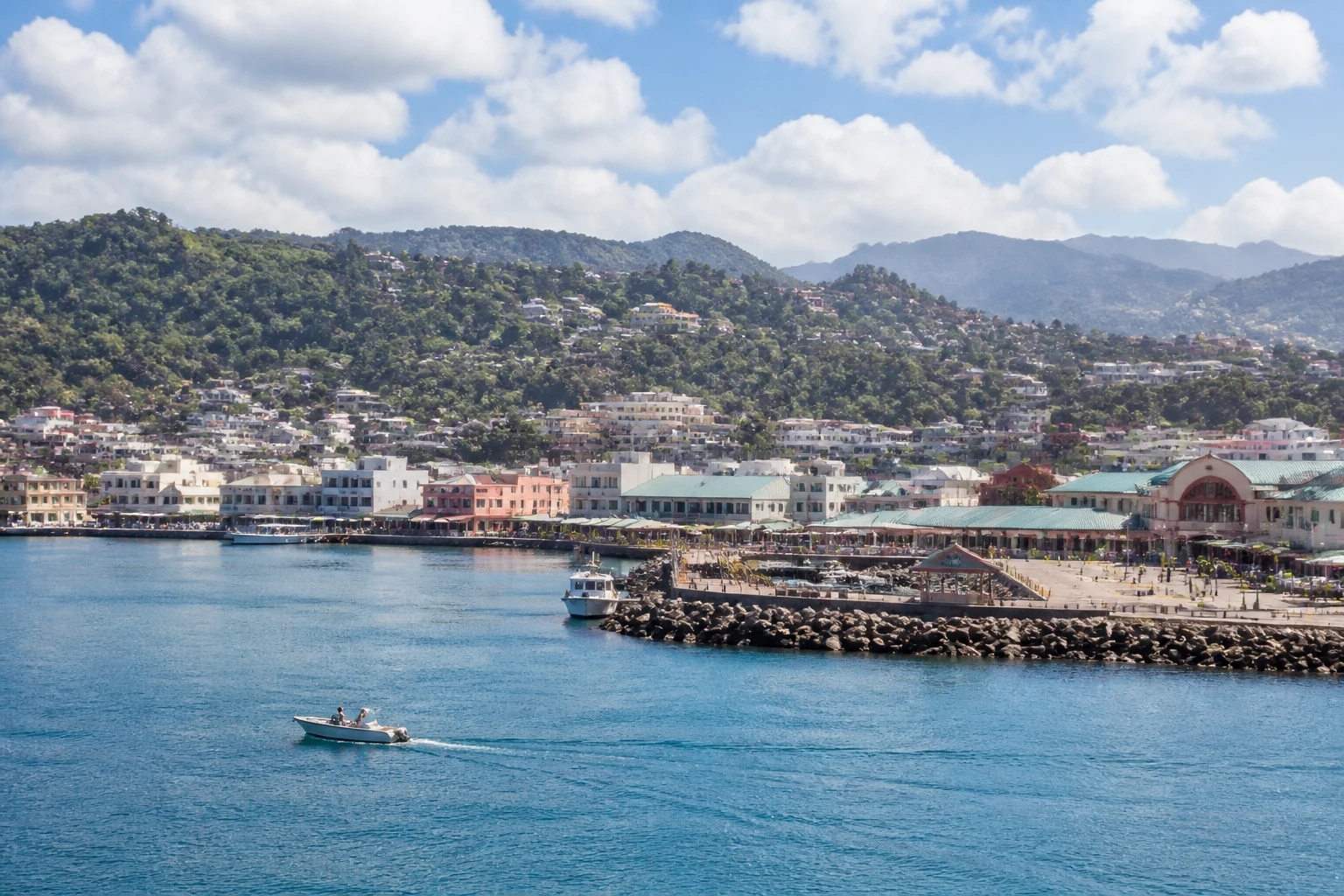 Representative cruise port destination view: Castries, Saint Lucia; passenger waterfront and harbor water, not an exact landmark photograph.