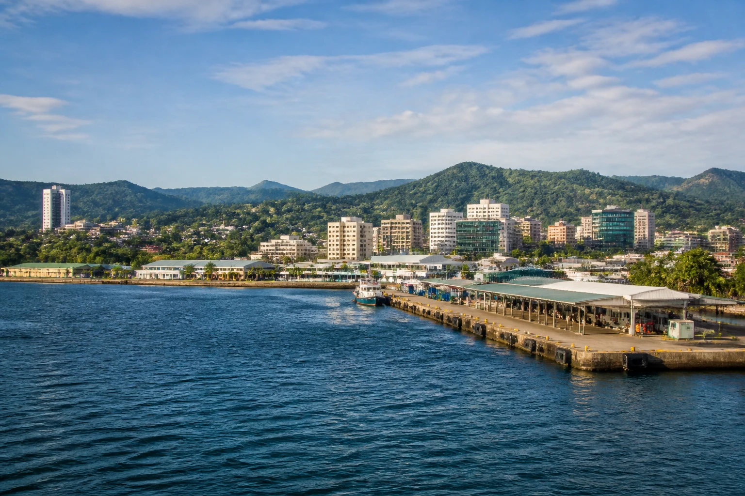 Representative cruise port destination view: Suva, Fiji; passenger waterfront and harbor water, not an exact landmark photograph.