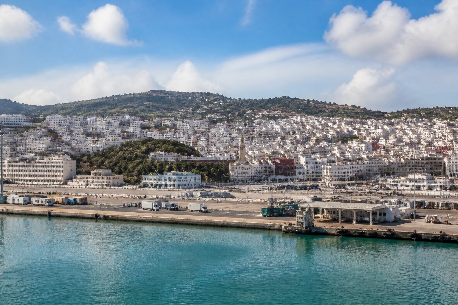 Representative cruise port destination view: Tangier, Morocco; passenger waterfront and harbor water, not an exact landmark photograph.