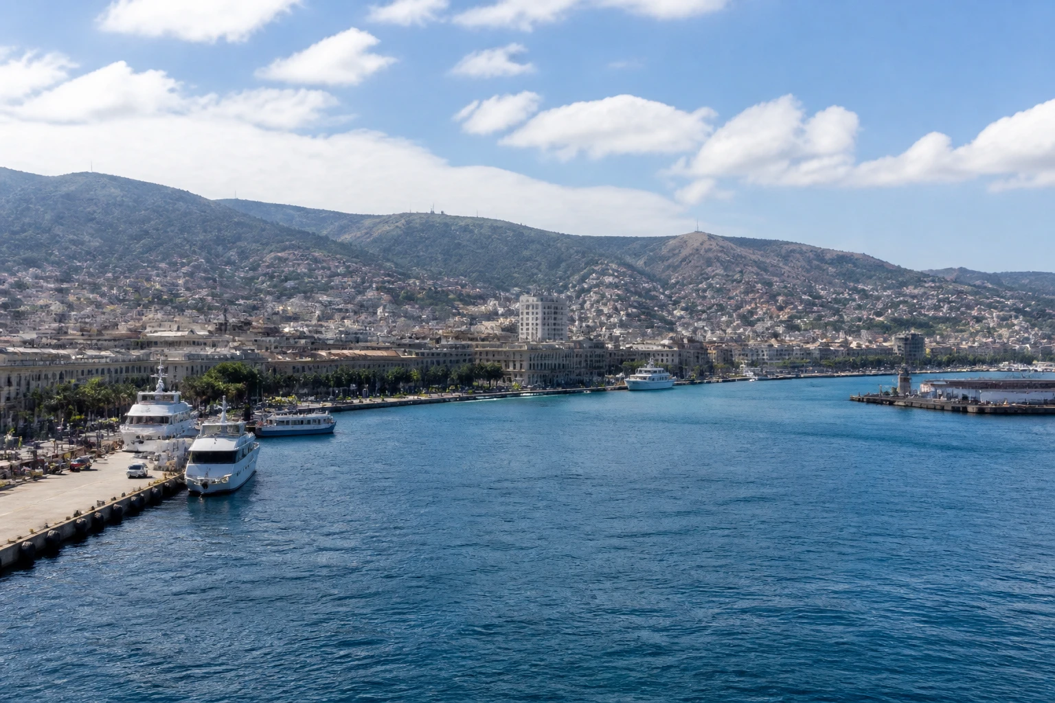 Representative cruise port destination view: Messina, Italy; passenger waterfront and harbor water, not an exact landmark photograph.