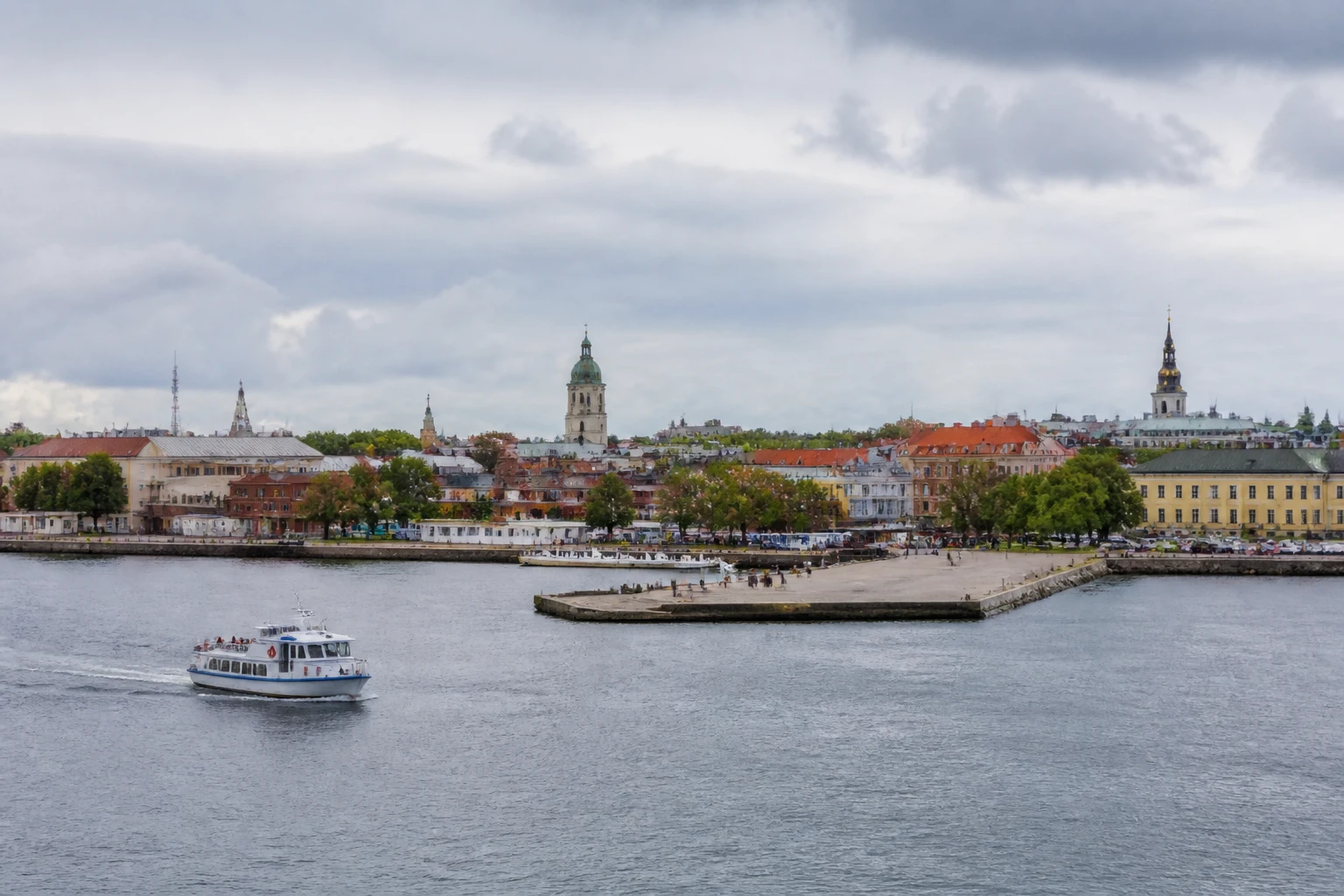 Representative cruise port destination view: Karlskrona, Sweden; passenger waterfront and harbor water, not an exact landmark photograph.
