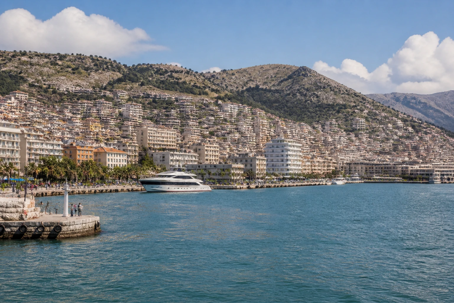 Representative cruise port destination view: Saranda, Albania; passenger waterfront and harbor water, not an exact landmark photograph.