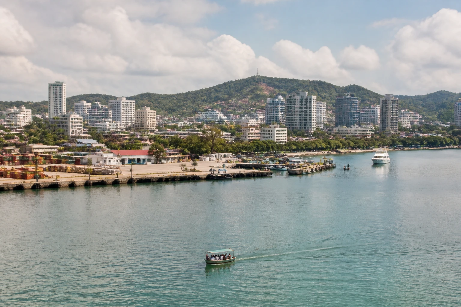 Representative cruise port destination view: Sihanoukville, Cambodia; passenger waterfront and harbor water, not an exact landmark photograph.