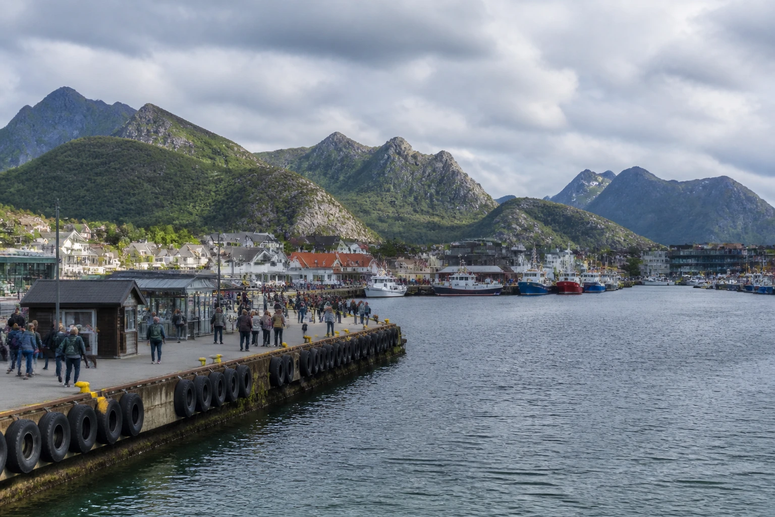 Representative cruise port destination view: Svolvaer, Norway; passenger waterfront and harbor water, not an exact landmark photograph.