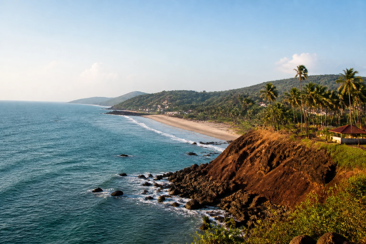 Representative coastal destination view: Goa, India; coastline and regional vegetation, not an exact landmark photograph.