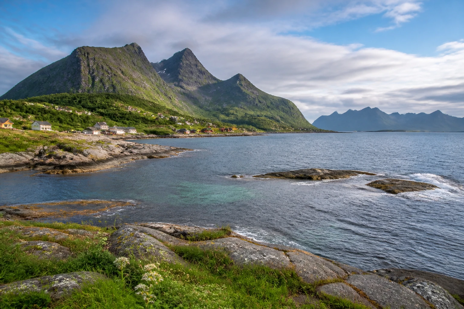 Representative island destination view: Lofoten Islands, Norway; coastline and regional vegetation, not an exact landmark photograph.