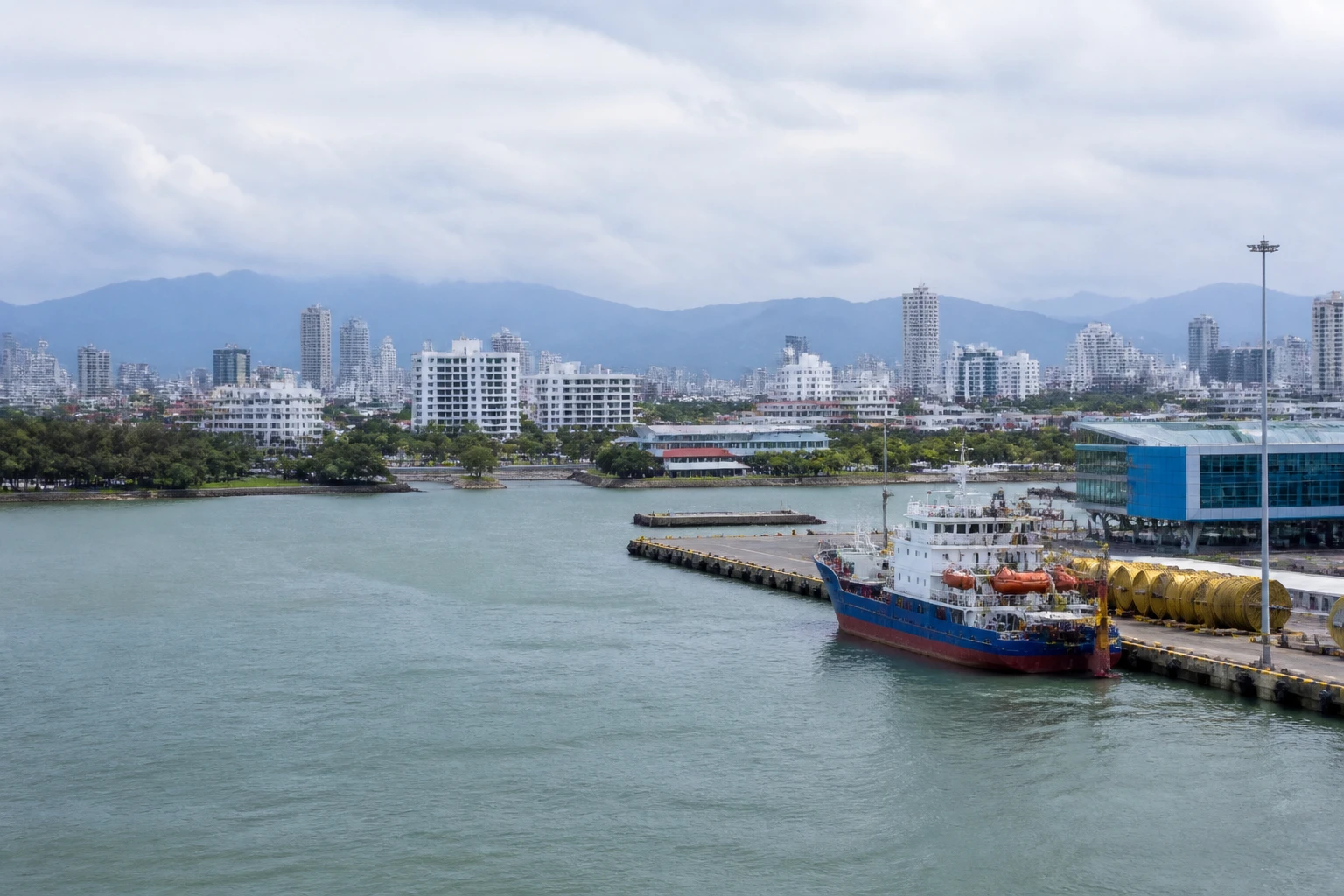 Representative cruise port destination view: Port Klang, Malaysia; passenger waterfront and harbor water, not an exact landmark photograph.