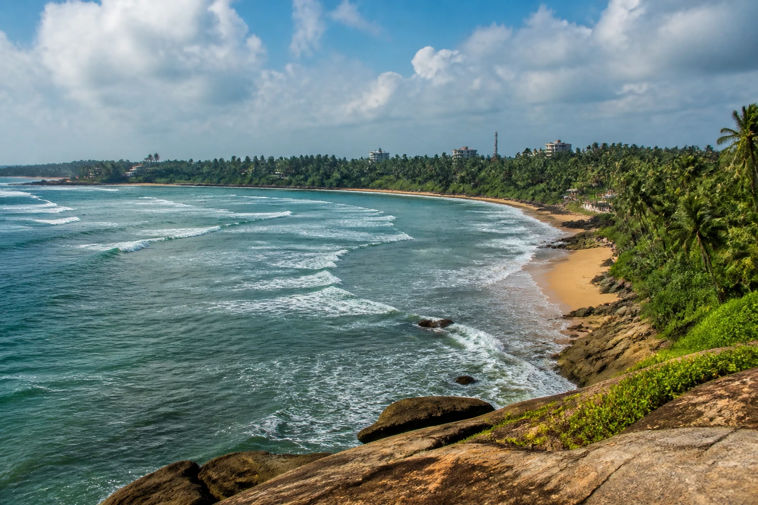 Representative coastal destination view: Colombo, Galle and the South Coast, Sri Lanka; coastline and regional vegetation, not an exact landmark photograph.