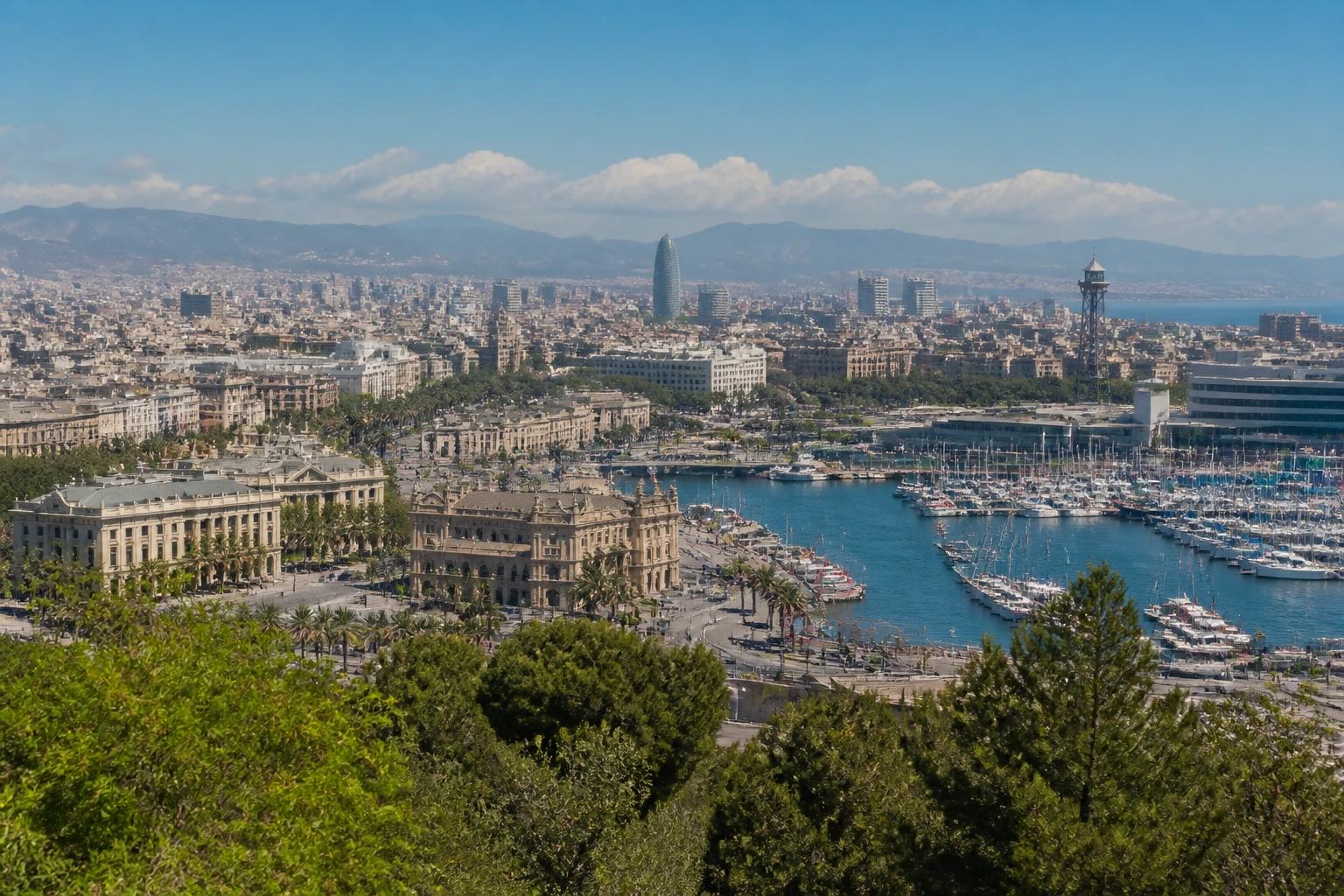 Representative city destination view: Barcelona, Spain; passenger waterfront and harbor water, not an exact landmark photograph.