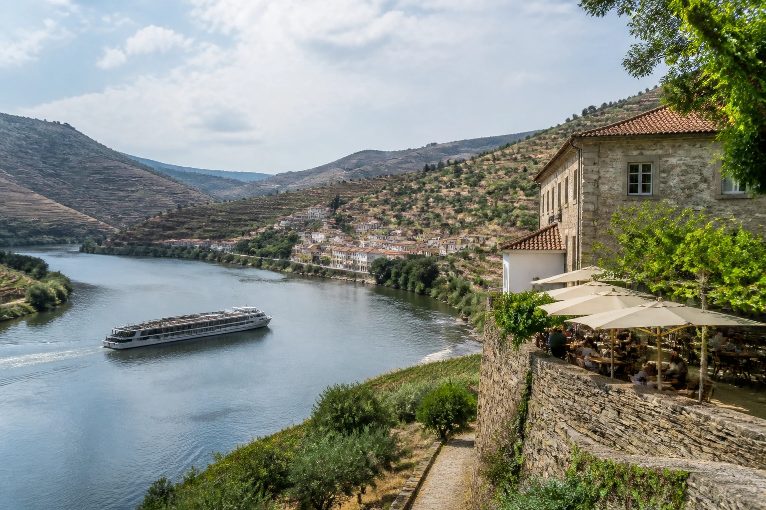 Representative river destination view: Douro Valley, Portugal; inland water, regional terrain, and vegetation, not an exact landmark photograph.