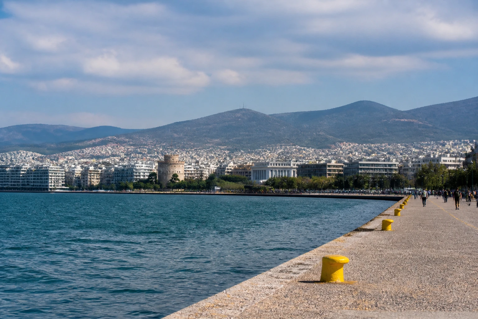 Representative cruise port destination view: Thessaloniki, Greece; passenger waterfront and harbor water, not an exact landmark photograph.