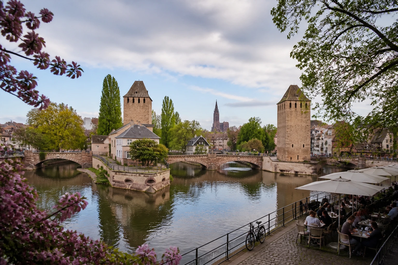 Representative river destination view: Strasbourg, France; inland water, regional terrain, and vegetation, not an exact landmark photograph.