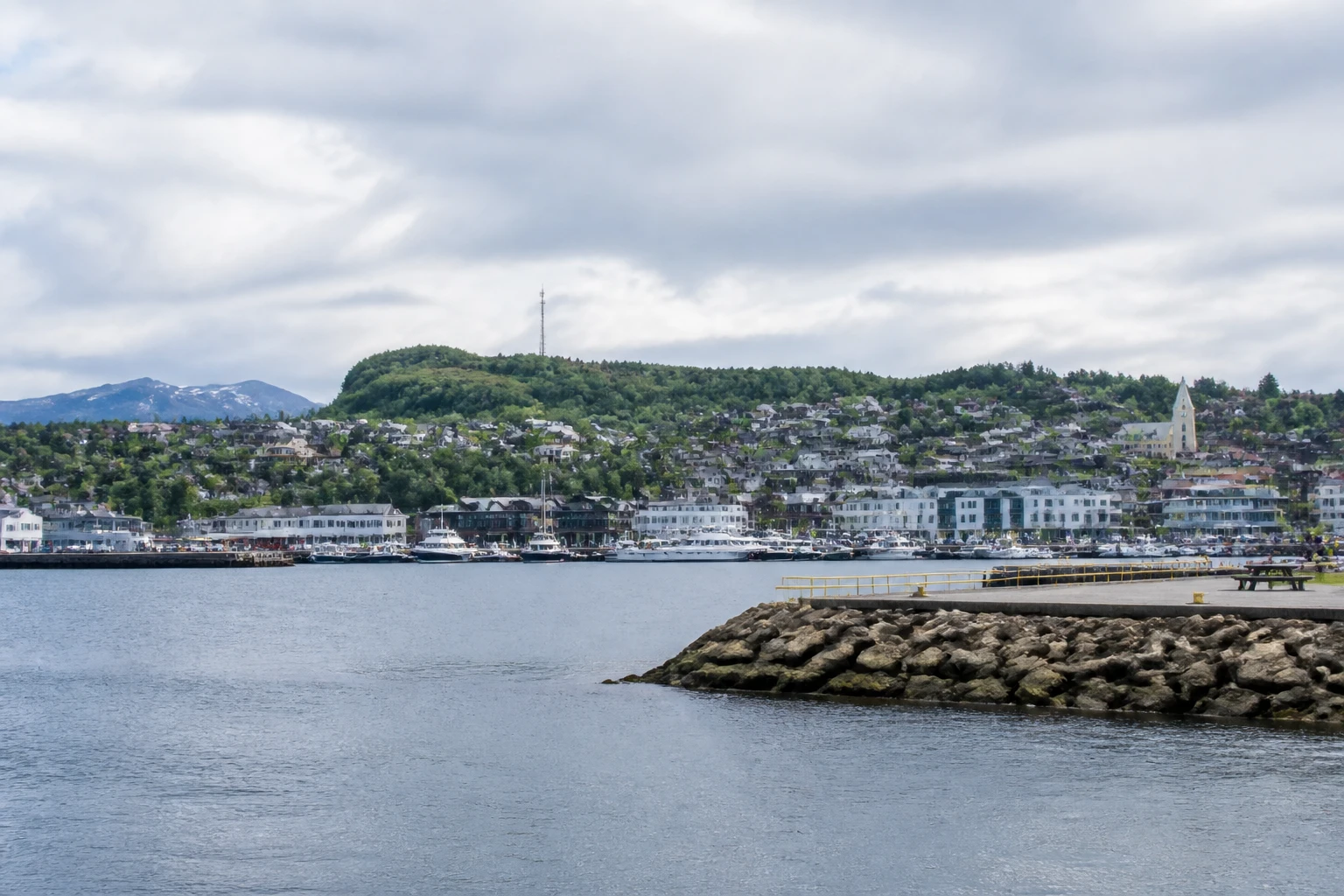 Representative cruise port destination view: Brønnøysund, Norway; passenger waterfront and harbor water, not an exact landmark photograph.