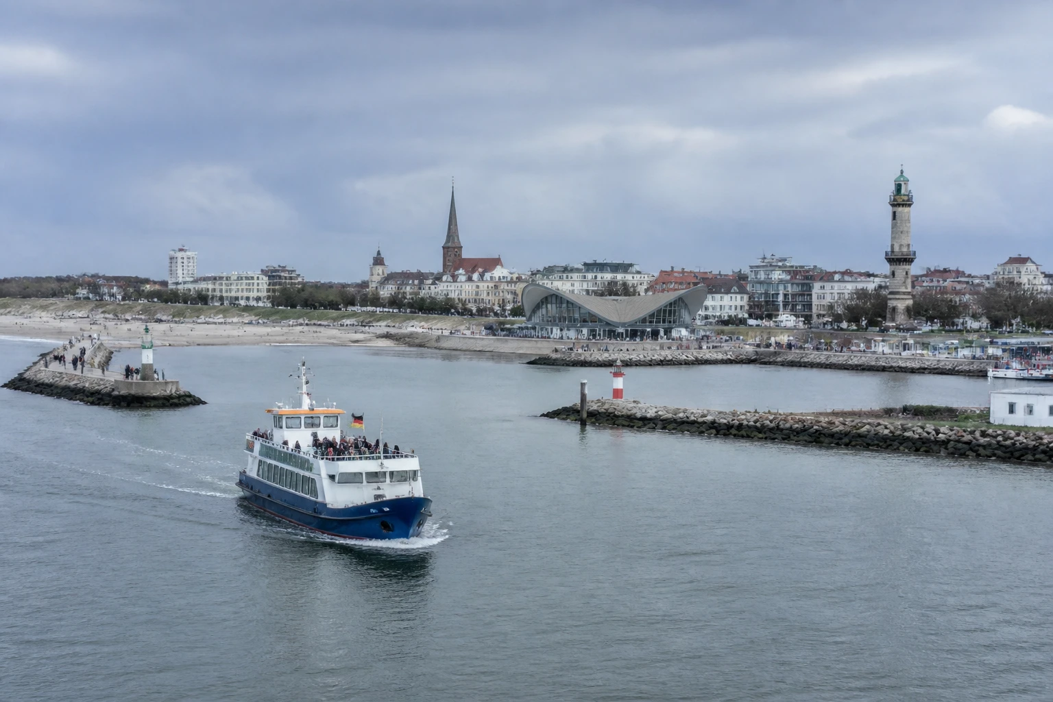 Representative cruise port destination view: Warnemünde, Germany; passenger waterfront and harbor water, not an exact landmark photograph.