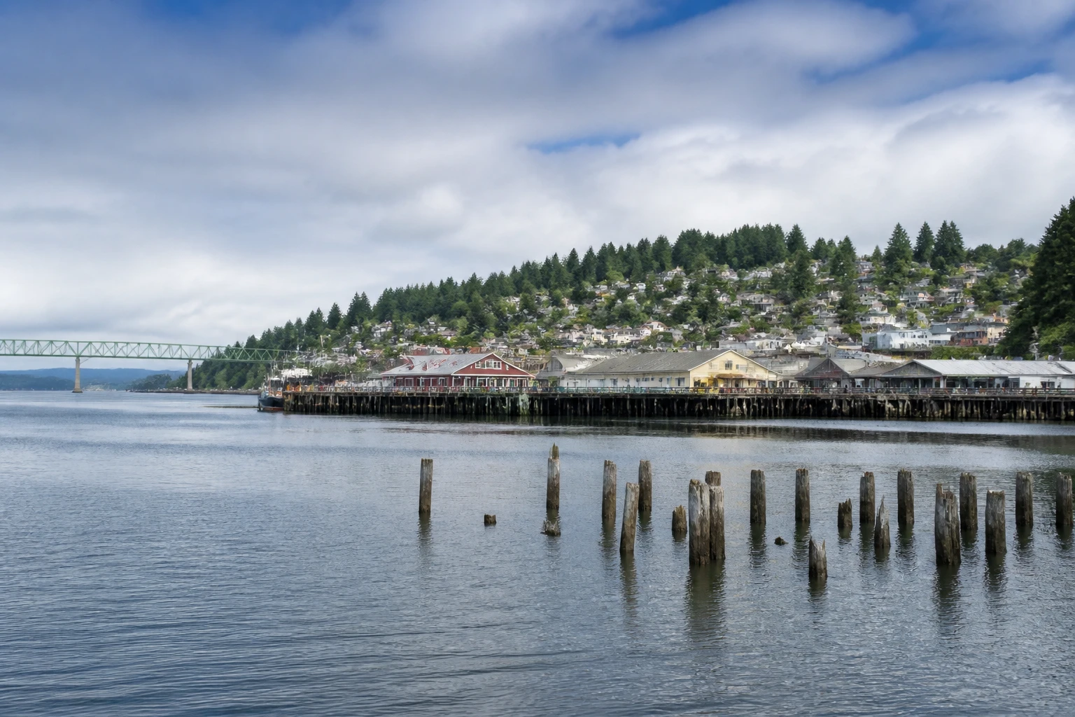 Representative cruise port destination view: Astoria, United States; passenger waterfront and harbor water, not an exact landmark photograph.