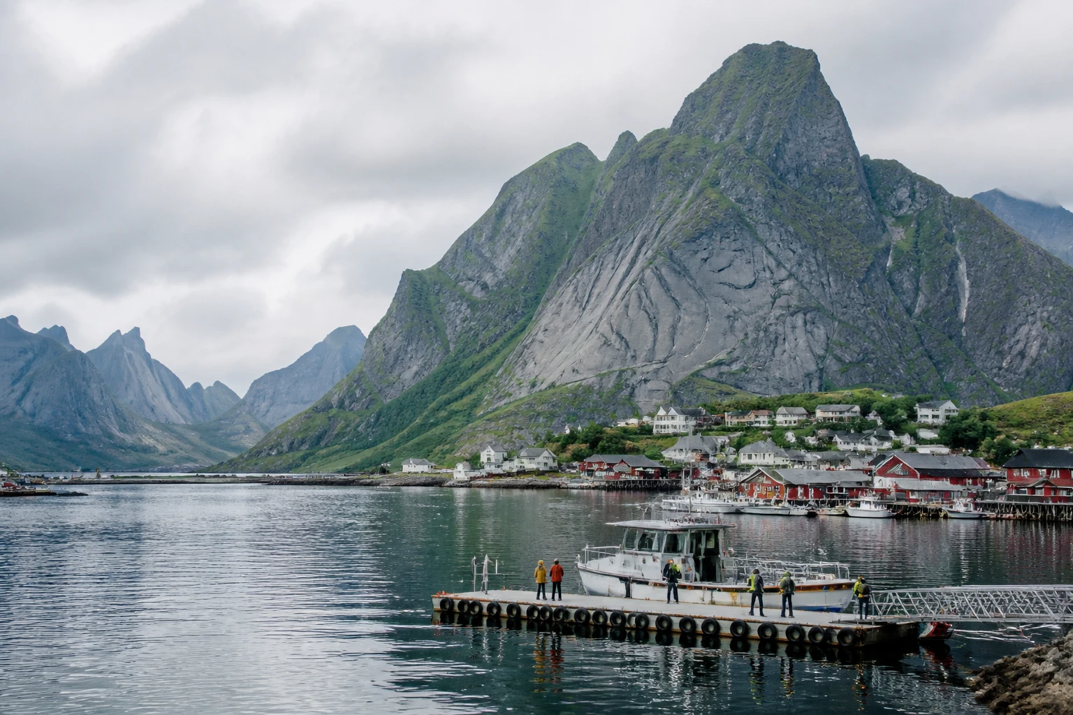 Representative cruise port destination view: Reine, Norway; passenger waterfront and harbor water, not an exact landmark photograph.