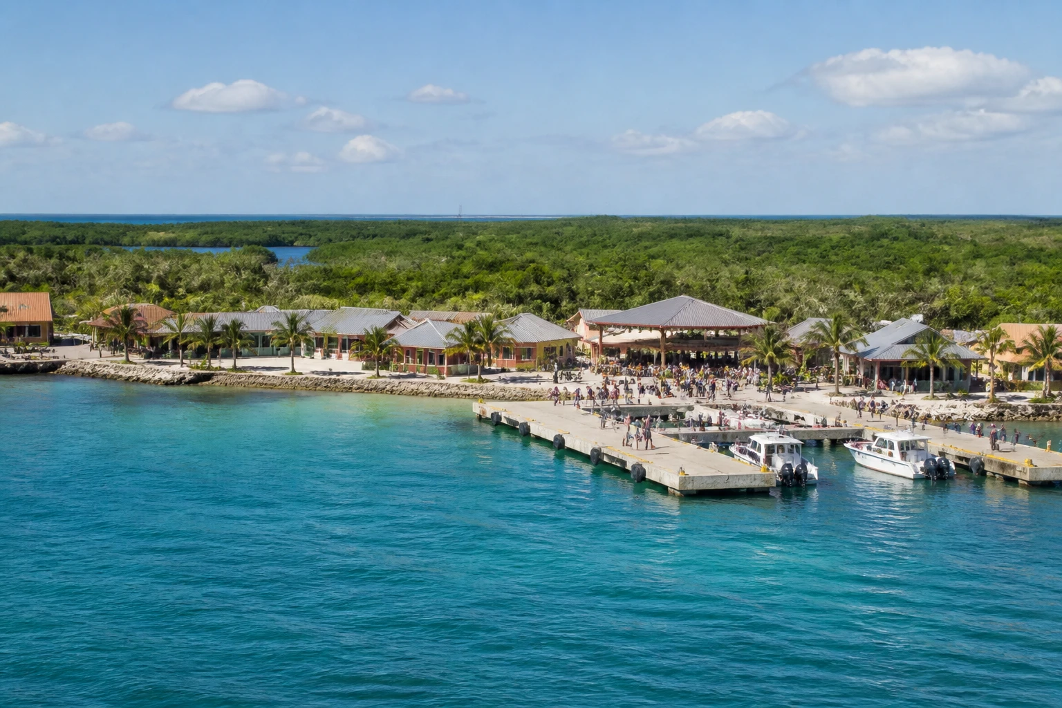 Representative cruise port destination view: Harvest Caye, Belize; passenger waterfront and harbor water, not an exact landmark photograph.