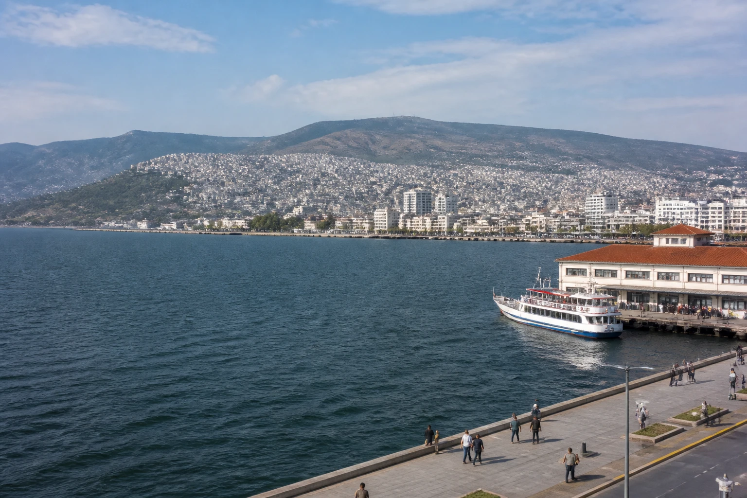 Representative cruise port destination view: Izmir, Turkiye; passenger waterfront and harbor water, not an exact landmark photograph.