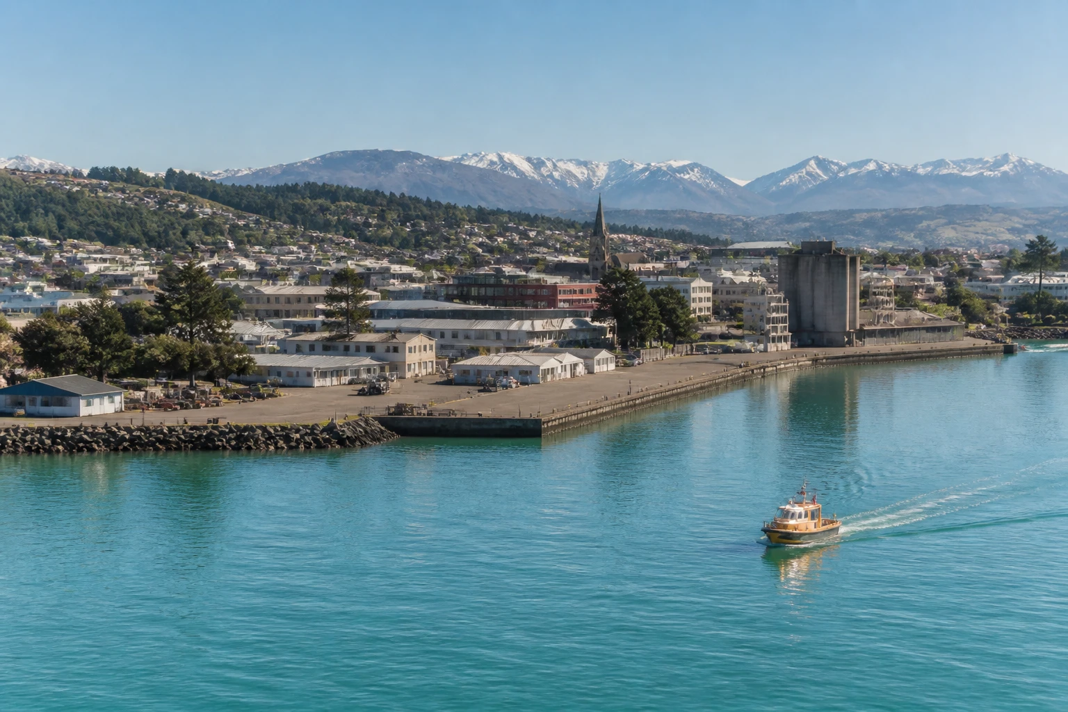 Representative cruise port destination view: Timaru, New Zealand; passenger waterfront and harbor water, not an exact landmark photograph.