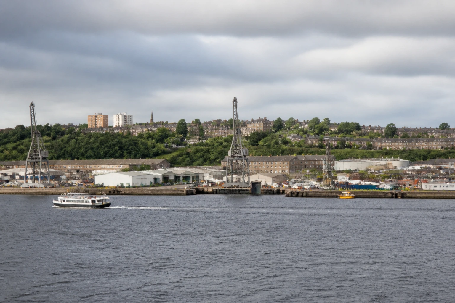 Representative cruise port destination view: Rosyth, United Kingdom; passenger waterfront and harbor water, not an exact landmark photograph.