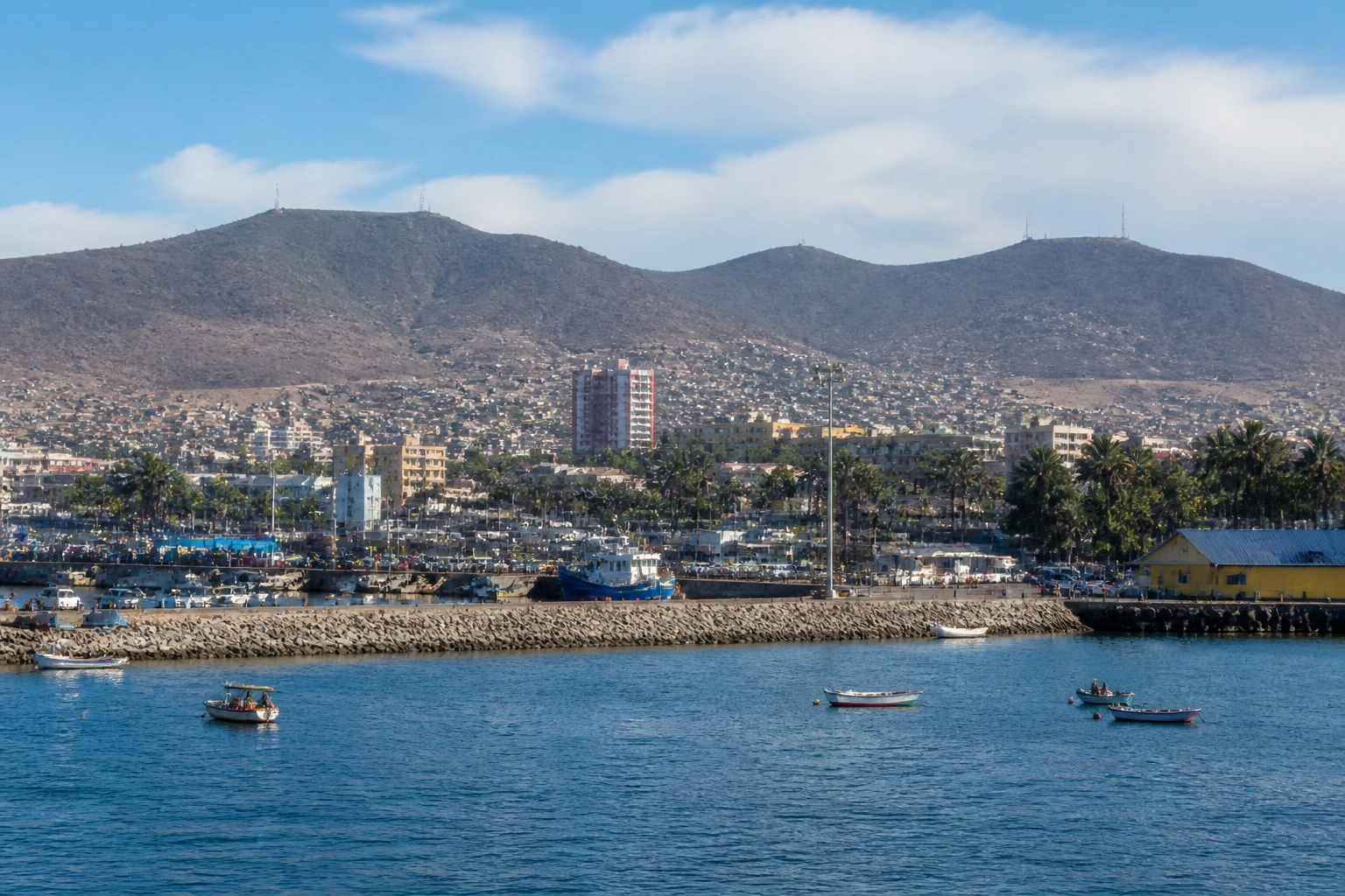 Representative cruise port destination view: Coquimbo, Chile; passenger waterfront and harbor water, not an exact landmark photograph.