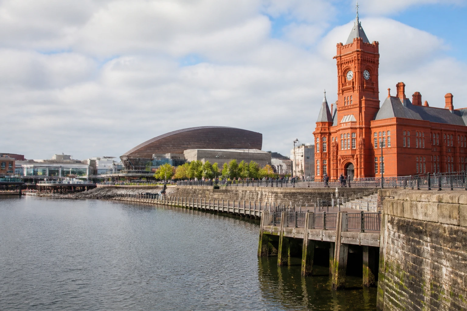 Representative city destination view: Cardiff, United Kingdom; passenger waterfront and harbor water, not an exact landmark photograph.