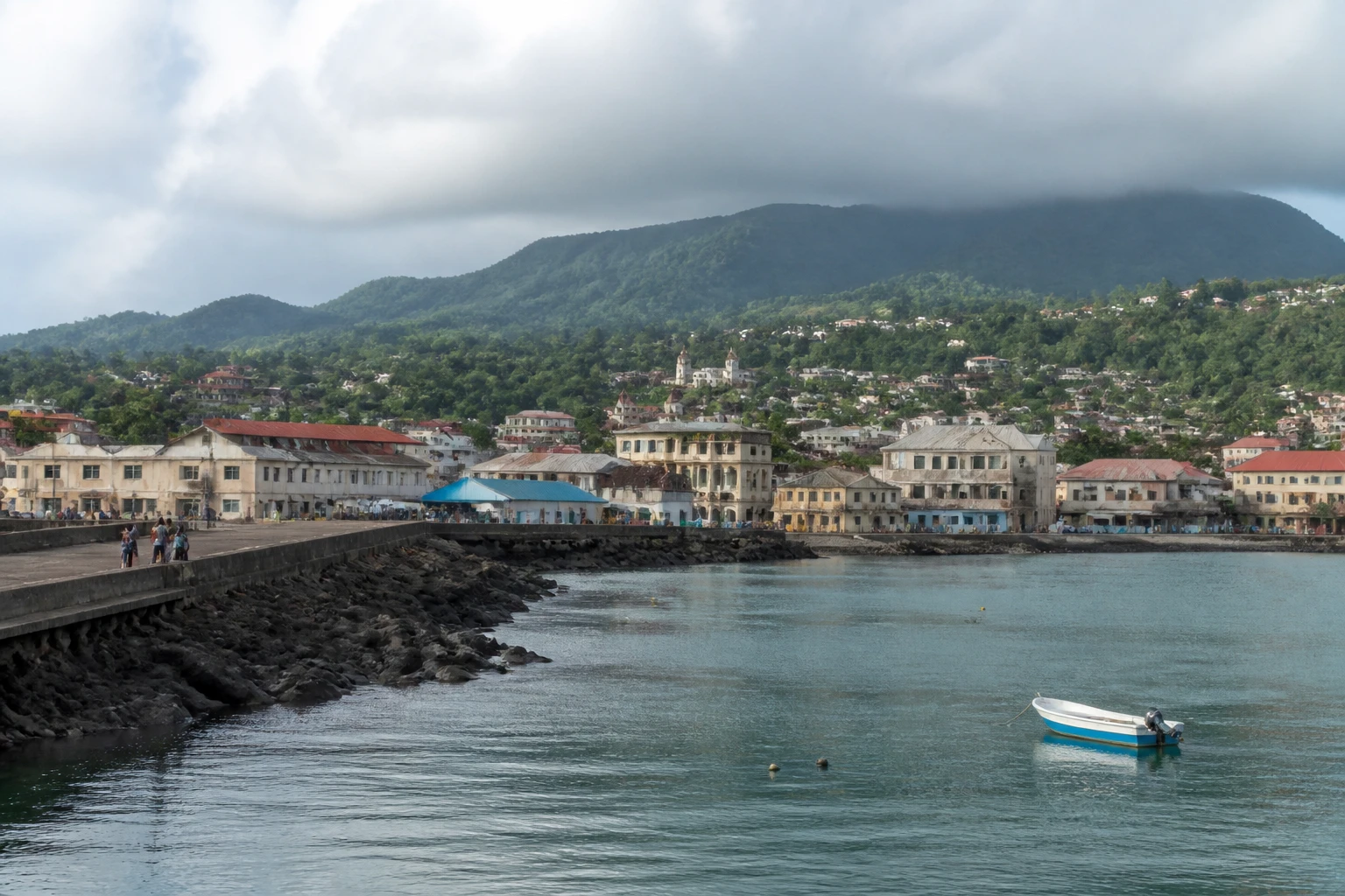 Representative cruise port destination view: Sao Tome; passenger waterfront and harbor water, not an exact landmark photograph.