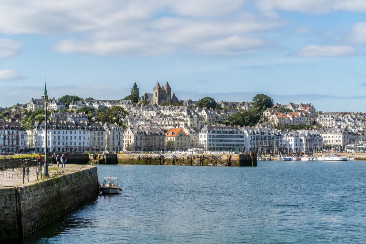 Representative cruise port destination view: St. Peter Port, Channel Islands; passenger waterfront and harbor water, not an exact landmark photograph.