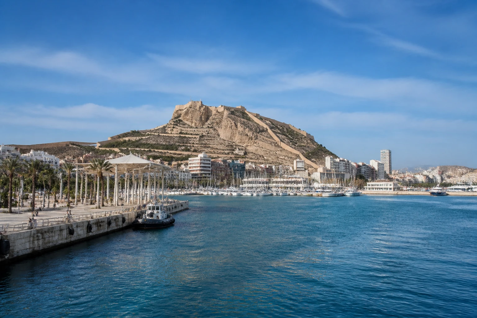 Representative cruise port destination view: Alicante, Spain; passenger waterfront and harbor water, not an exact landmark photograph.