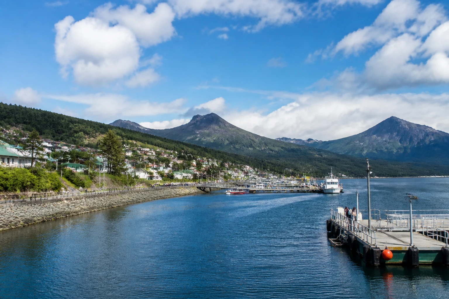 Representative cruise port destination view: Puerto Chacabuco, Chile; passenger waterfront and harbor water, not an exact landmark photograph.