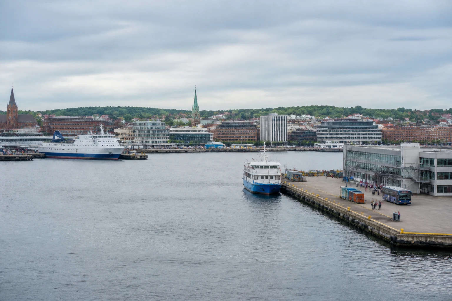 Representative cruise port destination view: Kiel, Germany; passenger waterfront and harbor water, not an exact landmark photograph.