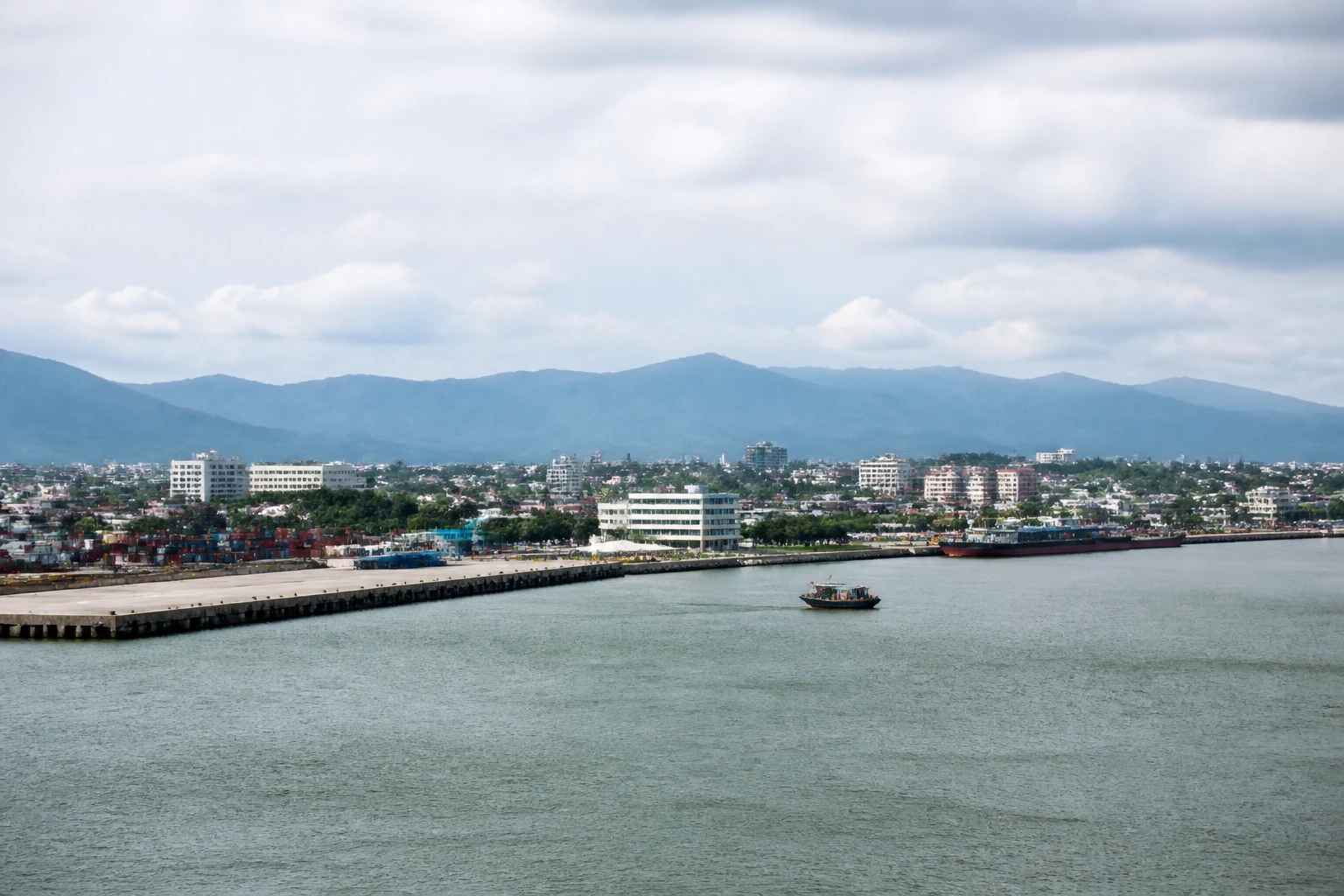 Representative cruise port destination view: Phu My, Vietnam; passenger waterfront and harbor water, not an exact landmark photograph.
