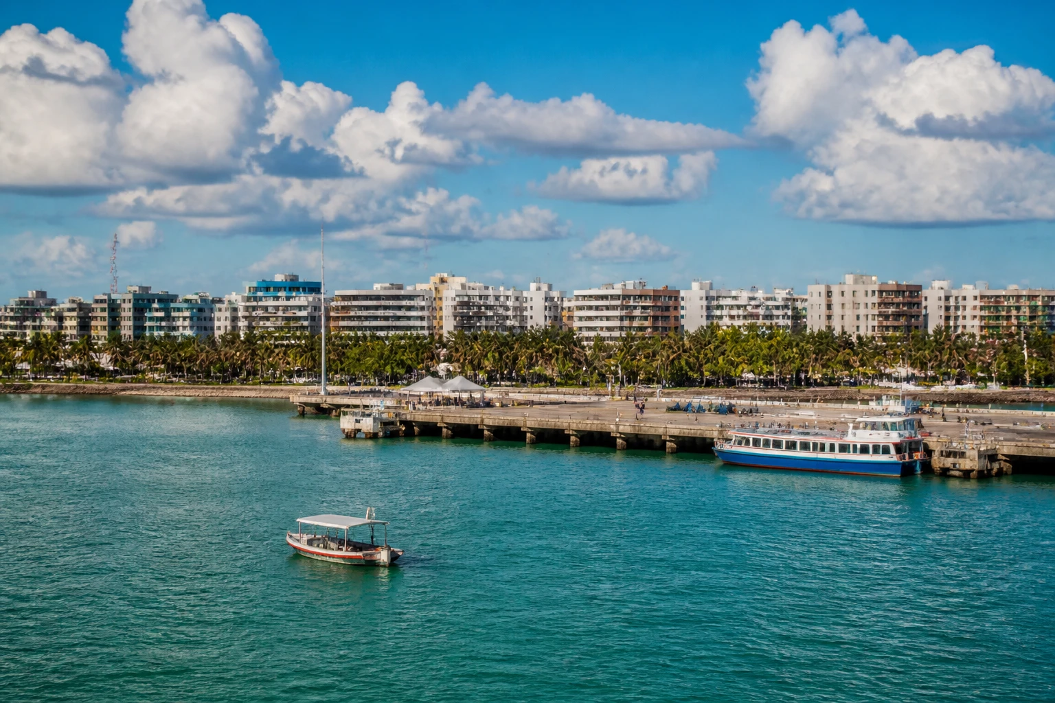 Representative cruise port destination view: Maceió, Brazil; passenger waterfront and harbor water, not an exact landmark photograph.