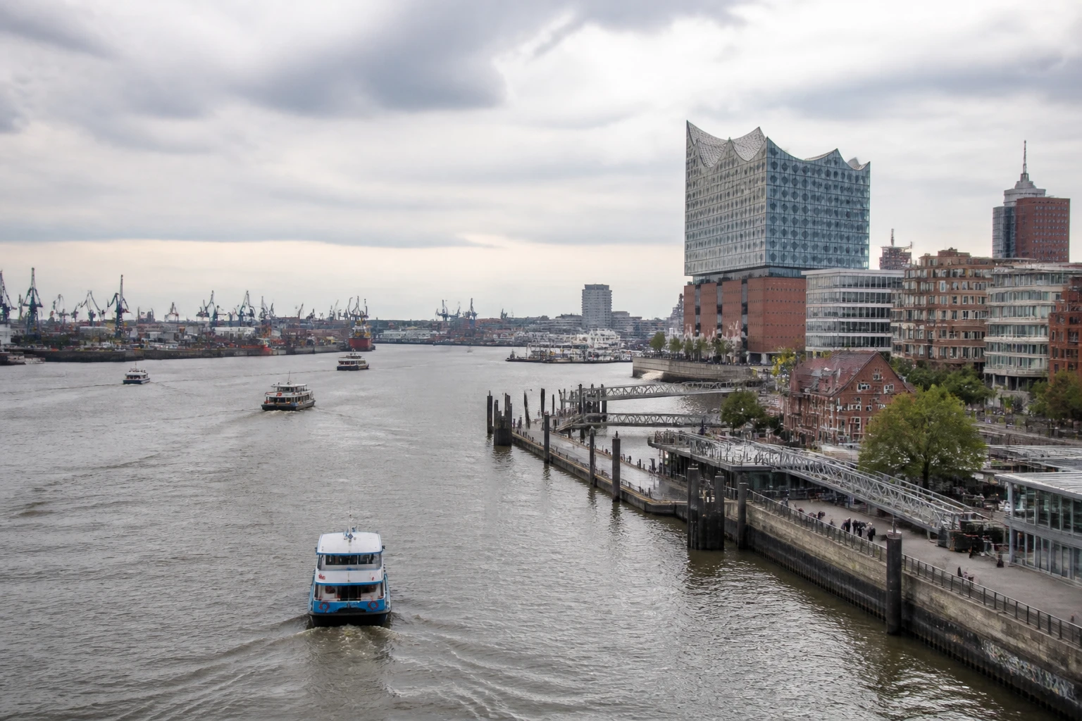 Representative cruise port destination view: Hamburg, Germany; passenger waterfront and harbor water, not an exact landmark photograph.