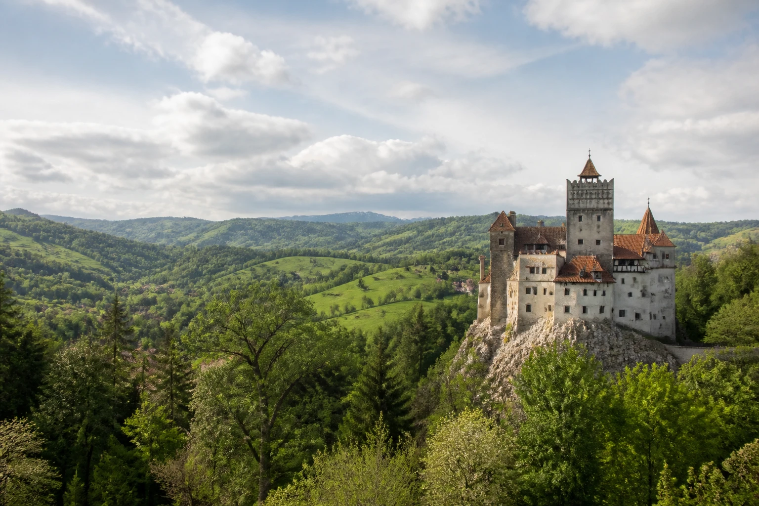 Representative nature destination view of Transylvania in Romania, with regional terrain, vegetation, and natural light; not an exact landmark photograph.