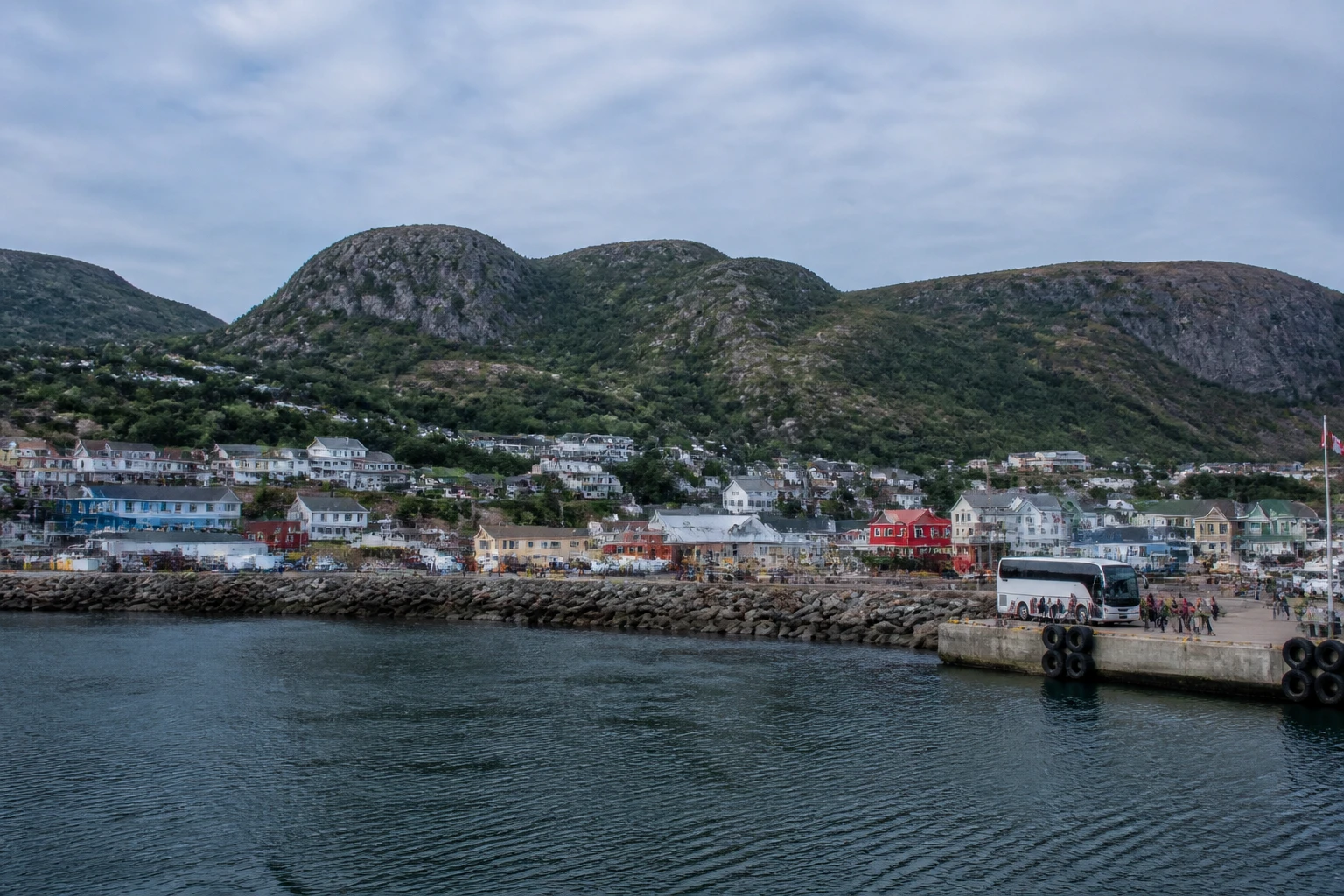 Representative cruise port destination view: St. Anthony, Canada; passenger waterfront and harbor water, not an exact landmark photograph.