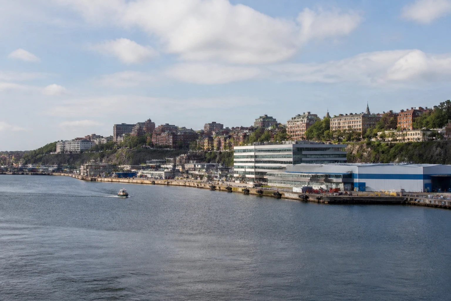 Representative cruise port destination view: Saint John, Canada; passenger waterfront and harbor water, not an exact landmark photograph.