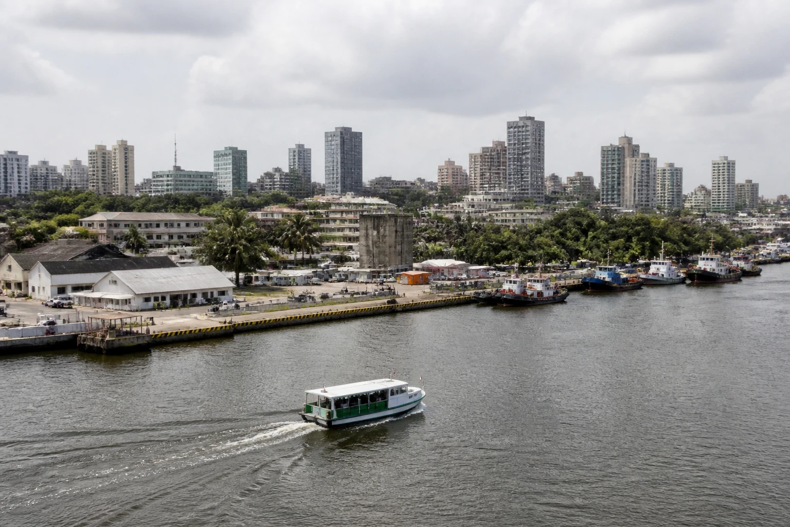 Representative cruise port destination view: Abidjan, Ivory Coast; passenger waterfront and harbor water, not an exact landmark photograph.
